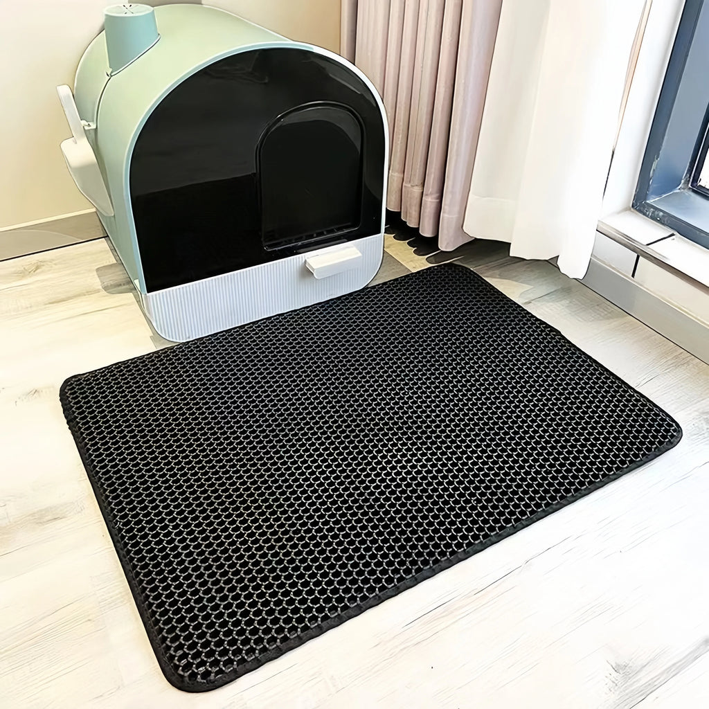 Tapis de litière pour chat, retient les grains, design élégant et nettoyage facile.