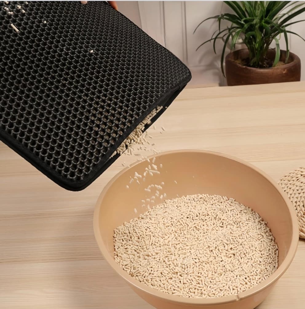 Tapis de litière pour chat, retient les grains, design élégant et nettoyage facile.
